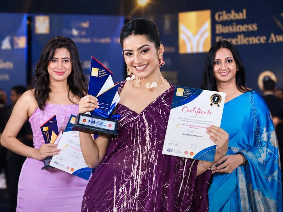 Women in Excellence campaign artwork showing three women with awards