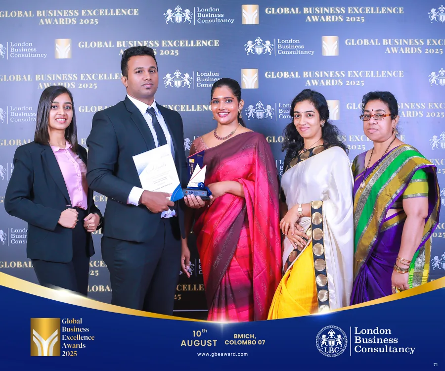 Award recipient with colleagues at the GBE Awards ceremony