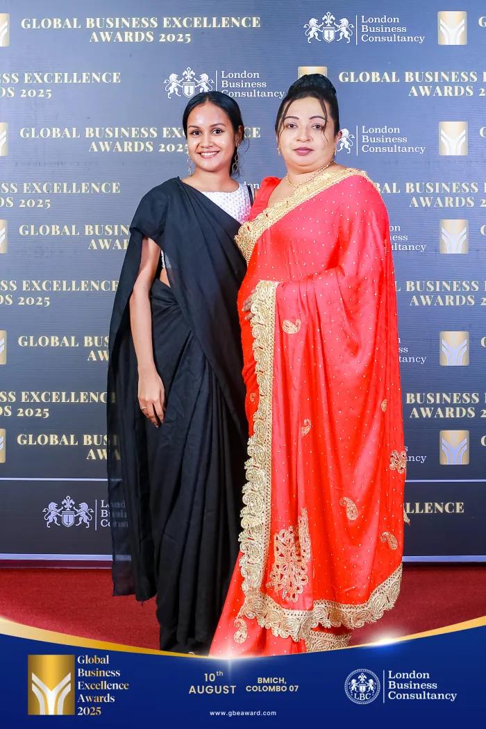 Two women photographed at the Global Business Excellence Awards ceremony